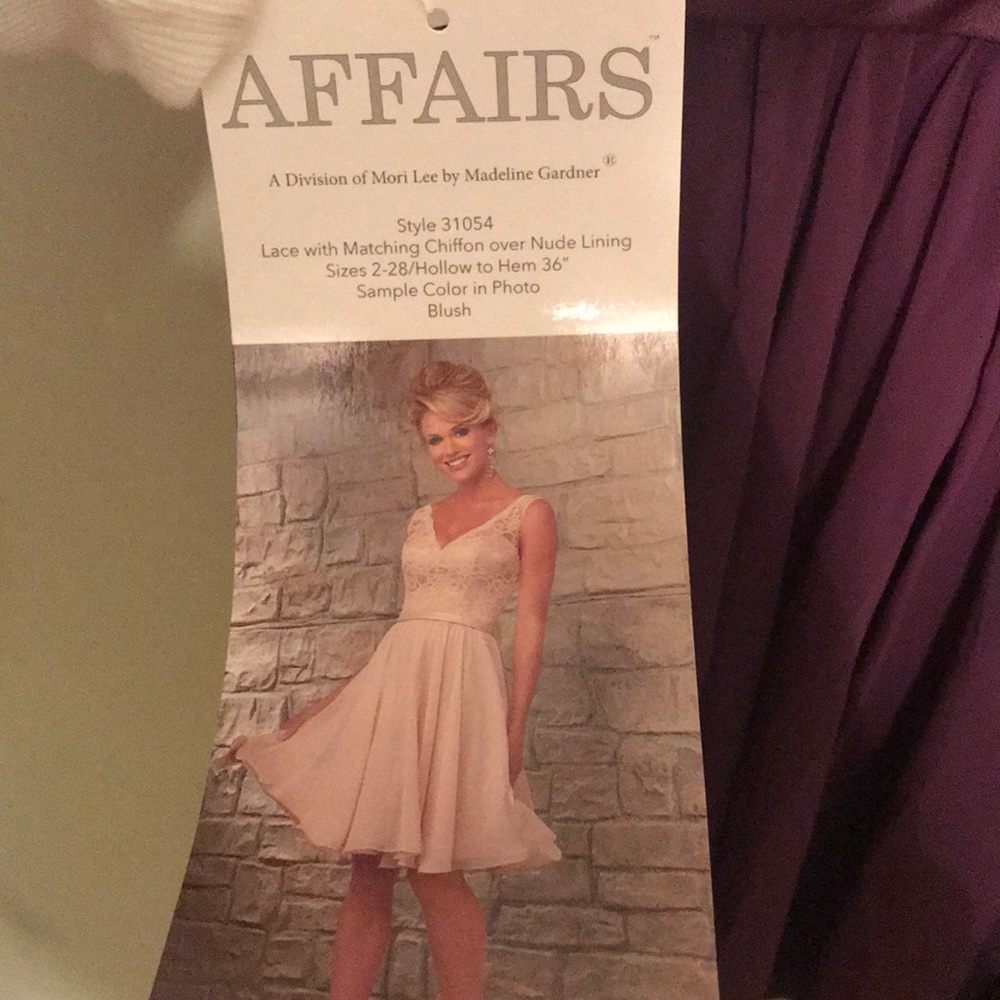 Never worn, stunning eggplant dress. Size 4. - Picture 3 of 3